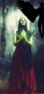 Woman in red dress prays in mystical forest with silhouetted winged figure.