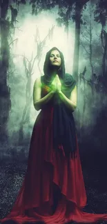 Woman in red gown praying in mystical forest with green glow.