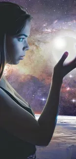 Woman holding orb in cosmic galaxy background wallpaper.