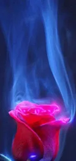 Mystical blue smoke swirling over a glowing pink rose on dark background.