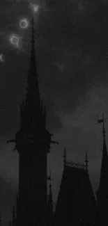 Gothic spires under a moonlit sky with dark clouds.