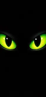 Mystical wallpaper with glowing green eyes.