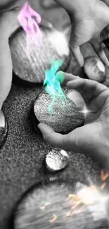 Artistic hands with glowing stones and magical colors in gray backdrop.