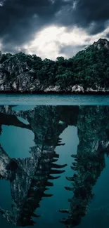 Mystical island with dramatic reflection underwater in vibrant teal hues.