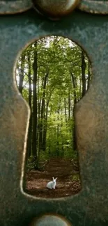 Keyhole view of a lush forest with a white rabbit on the path.