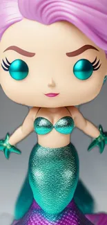 Mermaid-themed pastel pop toy in teal and purple tones, ideal for phone wallpaper.