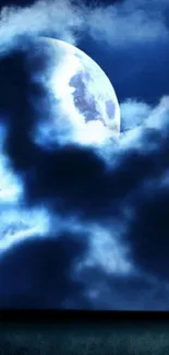 Moonlit night sky with dark blue clouds and glowing full moon.