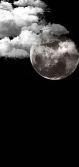 Moonlit night sky with clouds and moon in dark background.