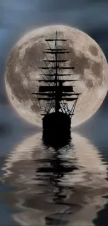 Silhouette of a ship against a full moon with its reflection on tranquil waters.