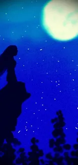 Silhouette under a bright full moon with a starry night sky.