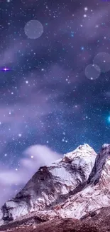 Mystical mountain landscape with a starry night sky wallpaper.