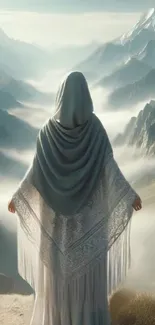 Cloaked figure stands in misty mountains, evoking tranquility and mystery.