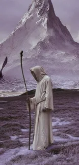 A robed figure with a staff near a towering mystical mountain under a lavender sky.