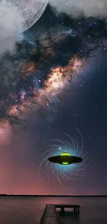 A UFO hovering under a vibrant galaxy in the starry night sky.