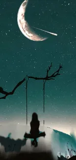 Silhouette on swing against crescent moon and teal night sky.