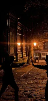 Silhouettes in a dimly lit urban street at night with warm, glowing lights.