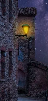 Stone village street at night with starry sky.