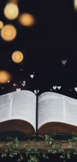 Open book with bokeh lights and ivy on mobile wallpaper.