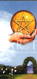 Hand holding glowing pentacle over landscape.