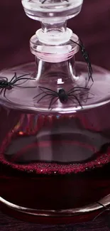 Burgundy potion bottle with black spiders on dark background.