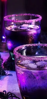 Mystical wallpaper with purple cocktails and a candle.