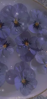 Purple flowers floating on water with a mystical sparkle effect.