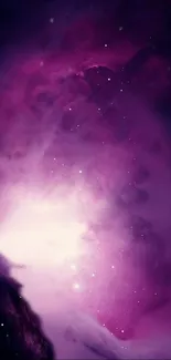 Vibrant purple nebula with starry glow, perfect phone wallpaper.