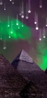 Pyramids beneath starry sky with green auroras