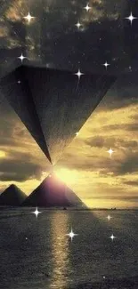 Golden sunset over pyramids creating a mystical atmosphere in this mobile wallpaper.