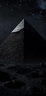 Pyramid under a starry night sky landscape.