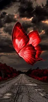 Red butterfly soaring against a dark, dramatic sky over a road.