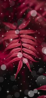 Mystical red leaf wallpaper with bokeh sparkles.