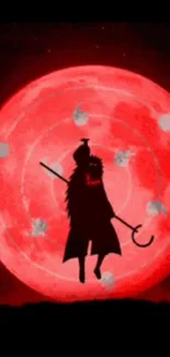 Silhouette of a warrior against a glowing red moon.