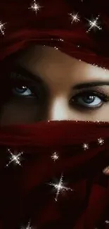 Mystical red veil wallpaper with striking eyes and starry accents.