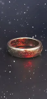 Golden ring on a dark cosmic background with sparkling stars.