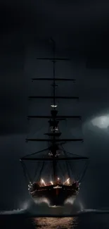 A majestic ship illuminated by lights sails through a dark, stormy night.