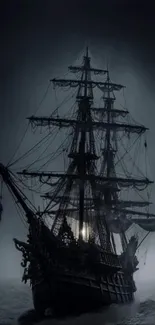 Foggy mystical ship wallpaper with dark and mysterious ambiance.