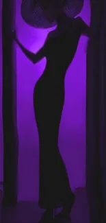 Silhouette of a woman in purple light creating a mystical ambiance.