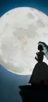 Silhouette of a woman with umbrella against a full moon on a cliff.