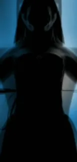 Silhouette of a mysterious figure with a blue background.