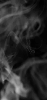 Mystical gray smoke against a black background, abstract wallpaper design.