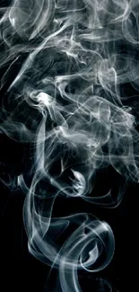 Swirling white smoke on a dark background, creating a mystical atmosphere.