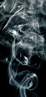 Mystical white smoke on deep black background wallpaper.