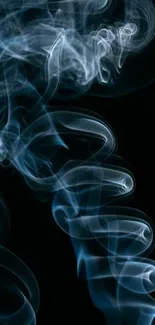 Ethereal blue smoke swirls on dark background, creating a mystical appearance.