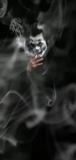 Mystical smoke on black background with shadowy figure.