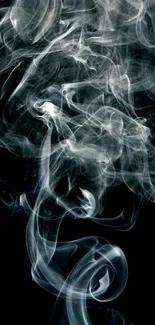 Mystical white smoke swirls on a black background wallpaper.