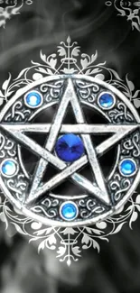 Mystical silver star with blue gems on smoky background.