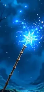 Magical glowing wand under starry night sky.