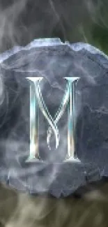 Mystical dark stone with letter M design wallpaper.