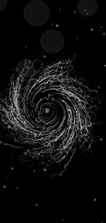 Intricate swirl galaxy on starry black background wallpaper.